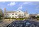 Attractive clubhouse with accessible parking, landscaped grounds, and classic architectural details at 12504 Ribbongrass Ct, Raleigh, NC 27614
