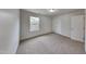 Comfortable bedroom with natural light from a large window at 128 Chownings Dr, Sanford, NC 27330