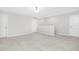 Spacious bedroom showcasing neutral carpeting, and two entry doors at 131 Explorer Dr # 257, Morrisville, NC 27560