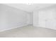 A clean and spacious bedroom featuring neutral carpeting, and closet with ample storage space at 131 Explorer Dr # 257, Morrisville, NC 27560
