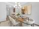 Elegant dining area with modern chandelier, stylish furnishings and decor at 131 Explorer Dr # 257, Morrisville, NC 27560