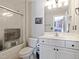 Clean bathroom featuring a shower, toilet, and white vanity at 132 Mantle Dr, Clayton, NC 27527