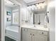Bright bathroom featuring a vanity and bathtub at 132 Mantle Dr, Clayton, NC 27527