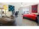 Eclectic bedroom featuring beanbag chair, gaming setup, and ceiling fan at 132 Mantle Dr, Clayton, NC 27527