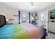 Bedroom featuring a colorful comforter, and large window at 132 Mantle Dr, Clayton, NC 27527
