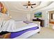 Bright main bedroom with a trey ceiling and a TV at 132 Mantle Dr, Clayton, NC 27527