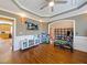 Inviting playroom featuring hardwood floors, recessed lighting and a decorative trey ceiling at 132 Mantle Dr, Clayton, NC 27527