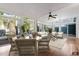 Sun room with lots of windows, light colored walls, and neutral furniture at 1408 Hunters Point Way, Cary, NC 27511