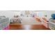 Bright attic area with play area, carpet, and a large window offering abundant natural light at 1500 Allen Ln, Hillsborough, NC 27278
