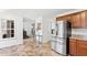 Bright kitchen with stainless steel appliances and custom cabinets at 1500 Allen Ln, Hillsborough, NC 27278