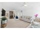 Spacious living room featuring a cozy fireplace and neutral decor, creating a relaxing atmosphere at 1500 Allen Ln, Hillsborough, NC 27278