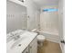 Bright bathroom with a single sink vanity and shower-tub combo at 1501 Copper Cir, Mebane, NC 27302