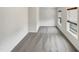Bedroom with neutral gray carpet, white walls, and wood trim windows at 1501 Copper Cir, Mebane, NC 27302