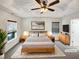 Spacious main bedroom with a vaulted ceiling and a large ceiling fan at 1501 Copper Cir, Mebane, NC 27302
