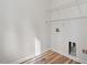 Laundry room with vinyl flooring, metal shelves, and hookups for a washer and dryer at 153 N Farm Dr, Clayton, NC 27527