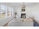Bright living room with fireplace, modern lighting, neutral walls, and views to the outside at 153 N Farm Dr, Clayton, NC 27527