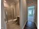 Bathroom featuring a glass-enclosed shower, vanity, and tile flooring at 1560 Bright Coral Trl, Wendell, NC 27591