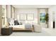 Bright bedroom with a comfortable bed, natural light, and modern decor at 1560 Bright Coral Trl, Wendell, NC 27591