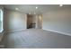 Spacious carpeted bonus room with recessed lighting and staircase at 1560 Bright Coral Trl, Wendell, NC 27591