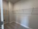 Walk in closet with wire shelves at 1560 Bright Coral Trl, Wendell, NC 27591