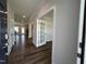 View from front door to foyer, living area, and kitchen at 1560 Bright Coral Trl, Wendell, NC 27591