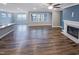 Spacious living room with fireplace and large windows for natural light at 157 Auburn Village Blvd, Raleigh, NC 27610