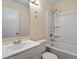 Bright bathroom with a white vanity, toilet, and shower/tub combination at 158 Torain St, Hillsborough, NC 27278