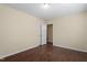 Empty bedroom with wood floors and a closet at 158 Torain St, Hillsborough, NC 27278