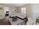 Bright living area featuring a white sofa and stylish decor at 158 Torain St, Hillsborough, NC 27278