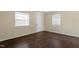 Inviting interior with hardwood floors and ample natural light from windows at 158 Torain St, Hillsborough, NC 27278