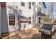 A spacious backyard deck features a grill and overlooks the backyard at 1705 Yates Pond Way, Raleigh, NC 27606