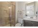 Elegant bathroom with a walk-in shower, sleek vanity, and modern fixtures, offering a spa-like experience at 1705 Yates Pond Way, Raleigh, NC 27606