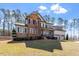 Spacious two-story home with stone and siding, nestled in a lovely neighborhood at 1705 Yates Pond Way, Raleigh, NC 27606