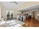 Open-concept living area flows seamlessly into a modern kitchen, perfect for entertaining and Gathering gatherings at 1705 Yates Pond Way, Raleigh, NC 27606