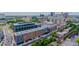 An aerial view captures a building complex in an urban area, showcasing its architectural design at 202 Duncan St, Raleigh, NC 27608