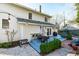 Spacious backyard features a patio, outdoor seating, grill and well-maintained landscaping at 202 Duncan St, Raleigh, NC 27608