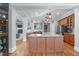 Spacious kitchen featuring a large island with stone countertops and stainless steel appliances at 202 Duncan St, Raleigh, NC 27608