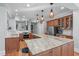Modern kitchen features custom cabinets, stainless appliances, and a large island for prep and dining at 202 Duncan St, Raleigh, NC 27608