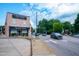 Hayes Barton Pharmacy retail building, showing the street and passing cars at 202 Duncan St, Raleigh, NC 27608