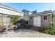Backyard features a charming storage shed, a gravel sitting area, and wooden fence at 202 Duncan St, Raleigh, NC 27608