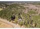 Aerial view of property showing tree coverage at 205 Old Greensboro Rd, Chapel Hill, NC 27516