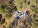 Aerial view of home and property, highlighting the wooded surroundings at 205 Old Greensboro Rd, Chapel Hill, NC 27516