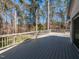 Spacious back deck perfect for entertaining and enjoying wooded backyard at 205 Old Greensboro Rd, Chapel Hill, NC 27516
