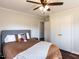 Cozy bedroom featuring a comfortable bed with neutral tones and a built in wardrobe at 205 Old Greensboro Rd, Chapel Hill, NC 27516