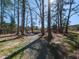 Picturesque backyard featuring a play set and outdoor seating area at 205 Old Greensboro Rd, Chapel Hill, NC 27516