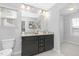 Bathroom with dual sinks, granite countertops, and plenty of storage space at 211 Explorer Dr # 263, Morrisville, NC 27560