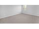 Bedroom featuring plush carpet and a window that provides natural light and views at 211 Explorer Dr # 263, Morrisville, NC 27560