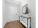 Welcoming entryway with a modern console table, decorative mirror, and stylish accents at 211 Explorer Dr # 263, Morrisville, NC 27560