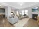 Cozy living room featuring comfortable seating, a fireplace, and hardwood floors at 211 Explorer Dr # 263, Morrisville, NC 27560