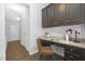 Dedicated office space with custom cabinetry, granite countertops, and ample storage at 211 Explorer Dr # 263, Morrisville, NC 27560